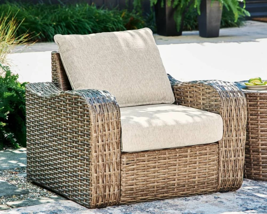 Signature Design by Ashley Sandy Bloom Light Brown & Beige Outdoor Resin Wicker Lounge Chair with Cushion - Casual Patio Furniture