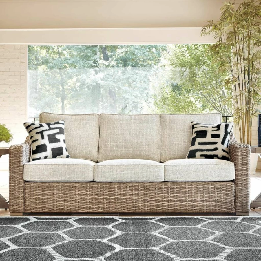 Signature Design by Ashley Beachcroft Outdoor Loveseat - Weather-Resistant Resin Wicker with Cushion & Pillows, Dark Brown & Beige Patio Furniture