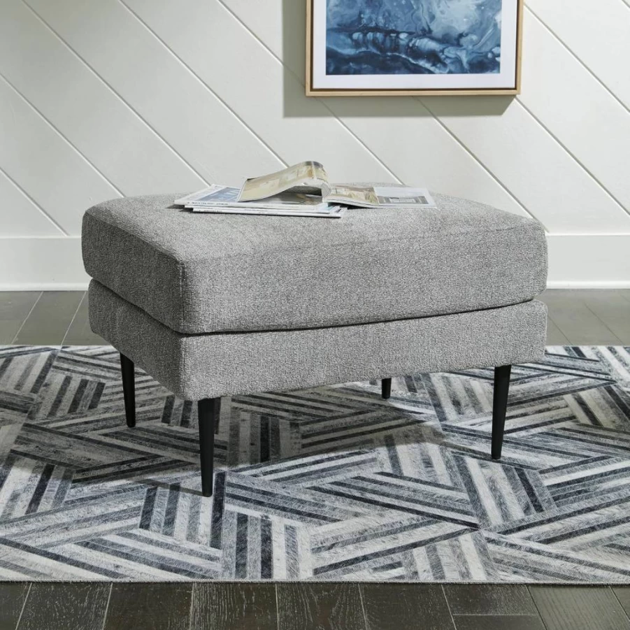 Signature Design by Ashley Hazela Modern Firm Cushion Rectangular Ottoman with Metal Legs in Gray & Black