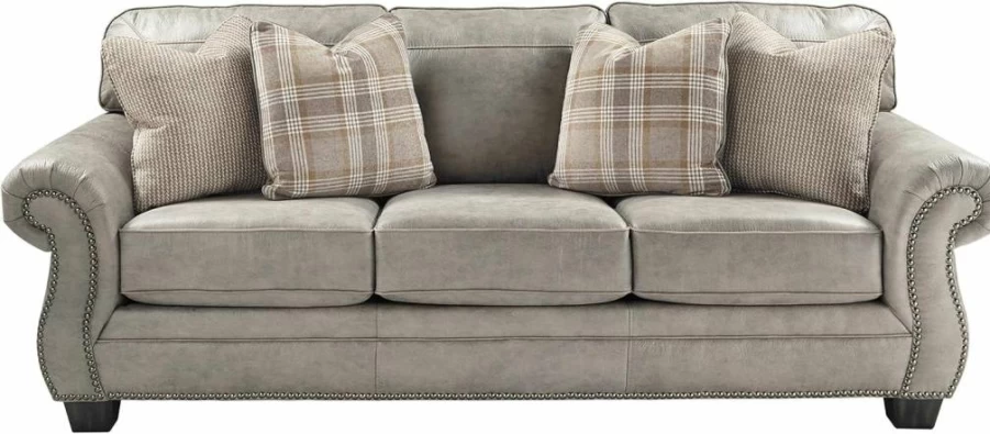 Signature Design by Ashley Olsberg Gray Faux Leather Sofa with Nailhead Trim & 4 Decorative Pillows