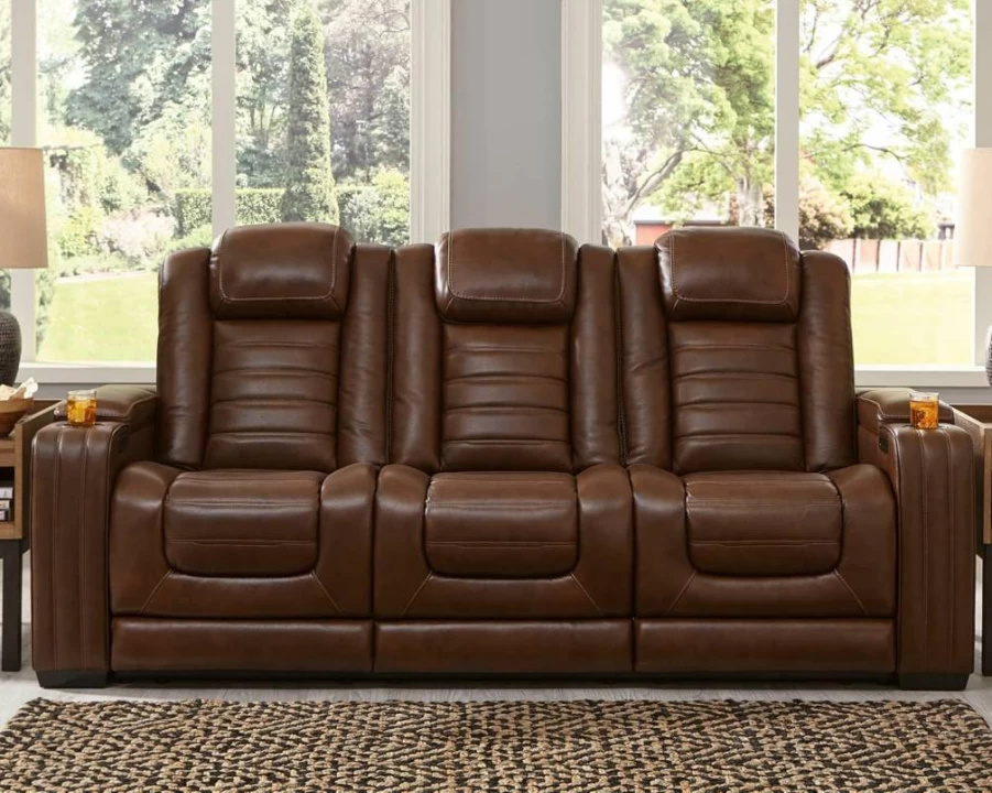 Signature Design by Ashley Man-Den Power Reclining Leather Sofa with Adjustable Headrest & Wireless Charging in Gray