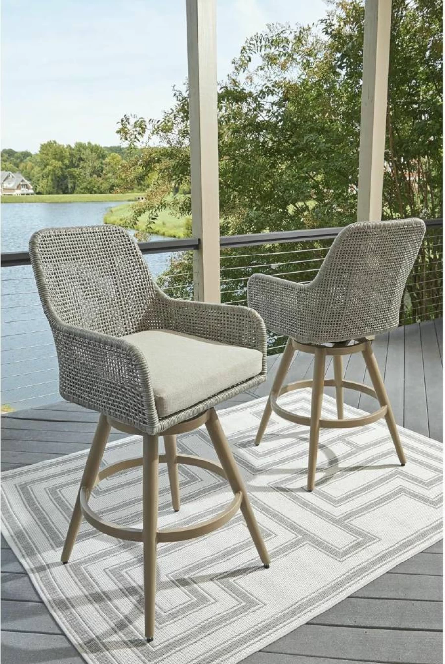 Signature Design by Ashley Seton Creek 2-Piece Outdoor Swivel Bar Stool Set with Cushion, Weather-Resistant Resin Wicker, Footrest & Armrest, Beige & Light Gray
