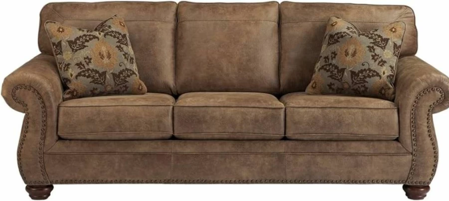 Signature Design by Ashley Larkinhurst Brown Faux Leather Sofa with Nailhead Trim & 2 Accent Pillows