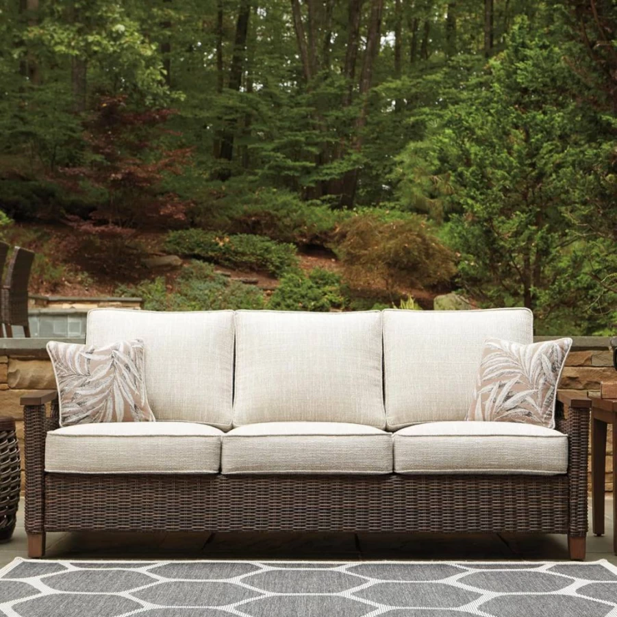 Signature Design by Ashley Paradise Trail 2-Piece Outdoor Swivel Lounge Chair Set in Beige Upholstery
